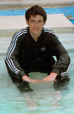 Swimming Training in Tracksuit